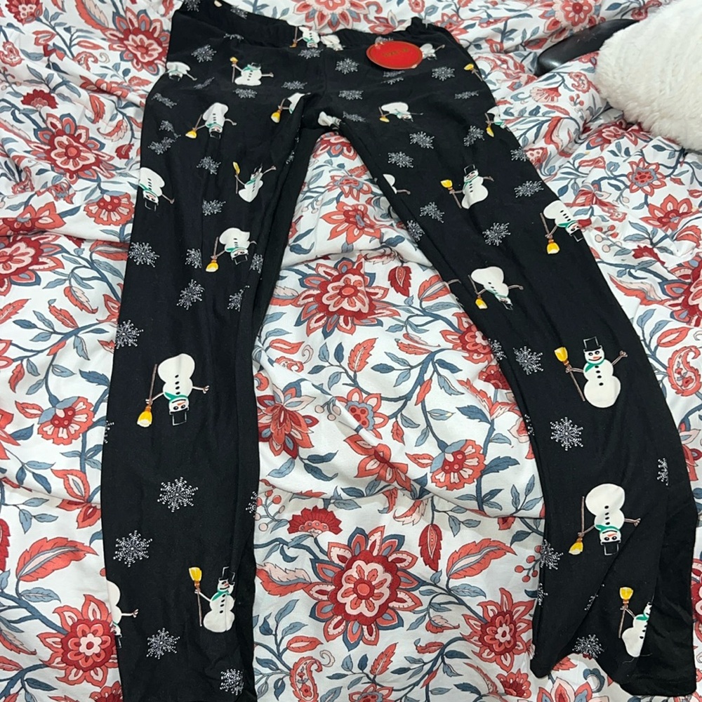 Twin pack Christmas leggings size M snowmanand solid black   New
